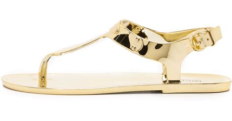 michael michael kors plate jelly sandals gold|Michael Kors flat thong sandals.